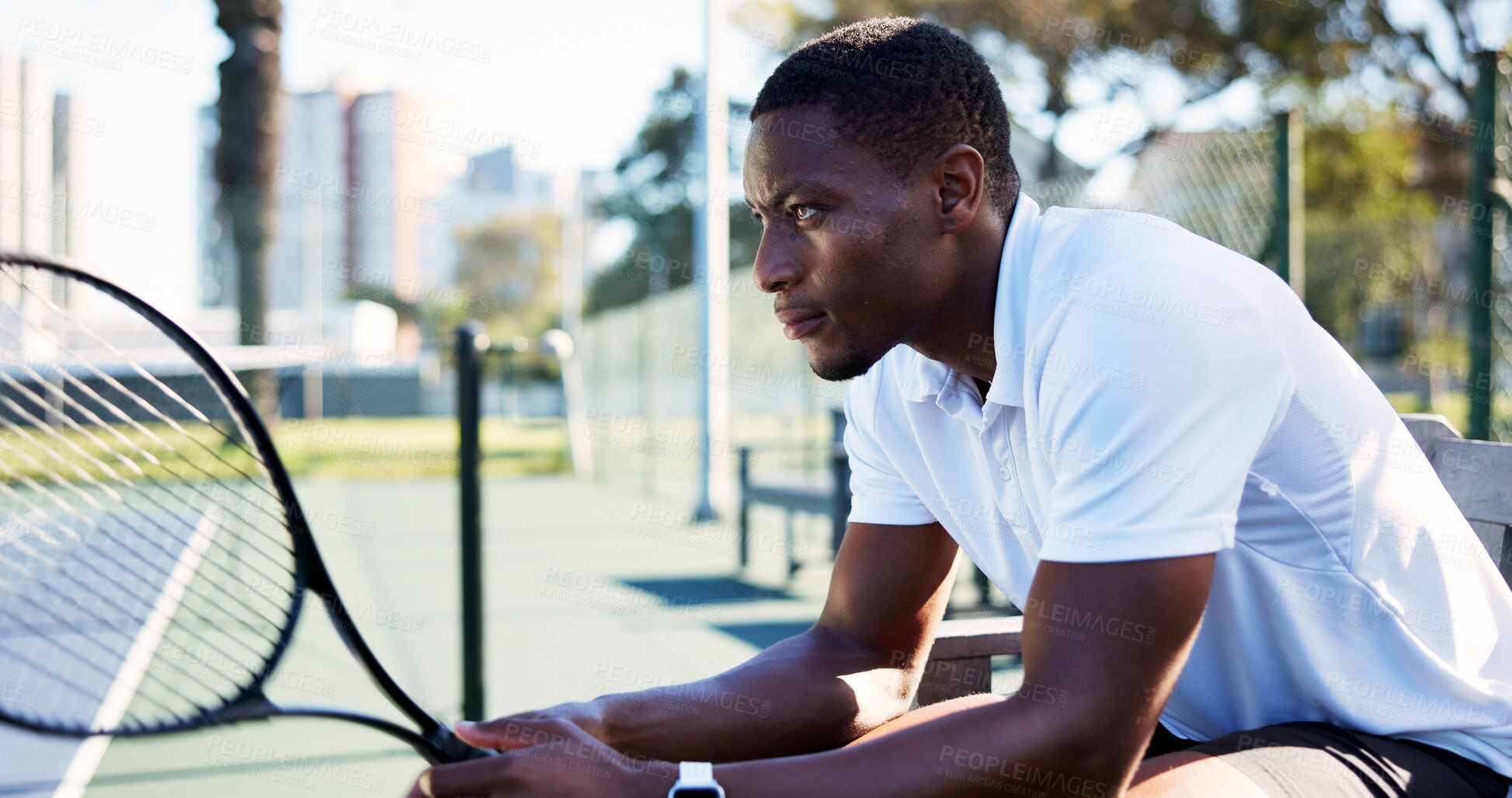 Buy stock photo Thinking, man and outdoor on bench with tennis racket for competition, tournament strategy or tactics. Reflection, black person and athlete on court with gear for game plan, sports match and contest.