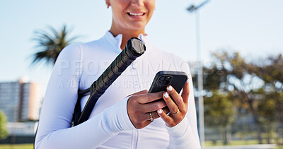 Buy stock photo Hands, smile and woman with phone on tennis court for fitness, training app and match progress. Happy, female person and mobile for sports notification, video demonstration and online tips for game