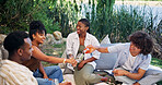 Friends, wine and smile with picnic for reunion, social gathering and bonding outdoor. People, laugh and communication with alcohol in nature for funny conversation, summer vacation and connection