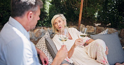 Buy stock photo Romance, conversation or couple at resort with wine, support or bonding in anniversary celebration. Honeymoon, love or mature people at lodge with drink, commitment or connection on date together