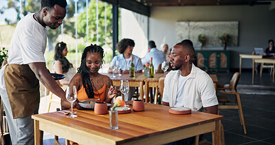 Buy stock photo Restaurant, waiter or serving plate to couple, romantic lunch date or fine dining experience for anniversary. Fancy cuisine, engagement celebration or server with gourmet food, hospitality or people