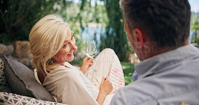 Buy stock photo Love, couple or woman at resort with wine, partner or bonding in anniversary celebration. Honeymoon, relationship or mature people at lodge with drink, commitment or chatting on romantic date