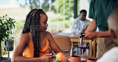 Buy stock photo Restaurant, waiter or serving wine for woman, romantic date or fine dining experience for anniversary. Fancy cuisine, marriage celebration or server with alcoholic drink, hospitality or couple dinner