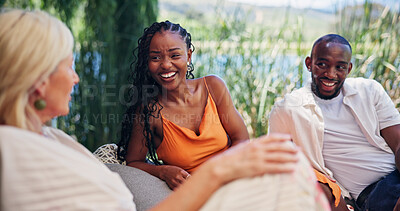 Buy stock photo Friends, laugh and talk outdoor at resort for summer holiday, social gathering and funny story. Happy people, relax and conversation in nature with humor for bonding together, connection and reunion.