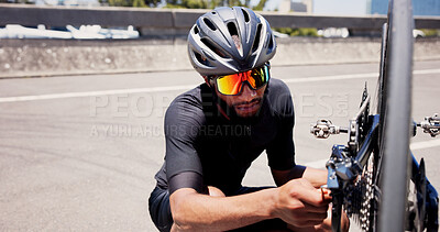 Buy stock photo Sports, repair and man with bicycle outdoor to check wheel, tire and gear alignment for maintenance. City, fitness and person fixing bike in town for cycling, training and active hobby for exercise