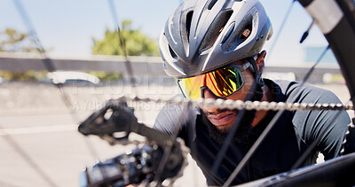 Buy stock photo Cyclist, repair and man with bicycle in city to check wheel, tire and gears for maintenance outdoor. Sports, fitness and person fixing bike in town for cycling, training and active hobby for exercise