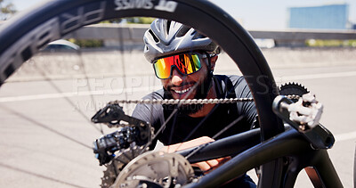 Buy stock photo Sports, repair and man with bicycle in street to check wheel, tire and gears for maintenance outdoor. Happy, fitness and person fixing bike in city for cycling, training and active hobby for exercise