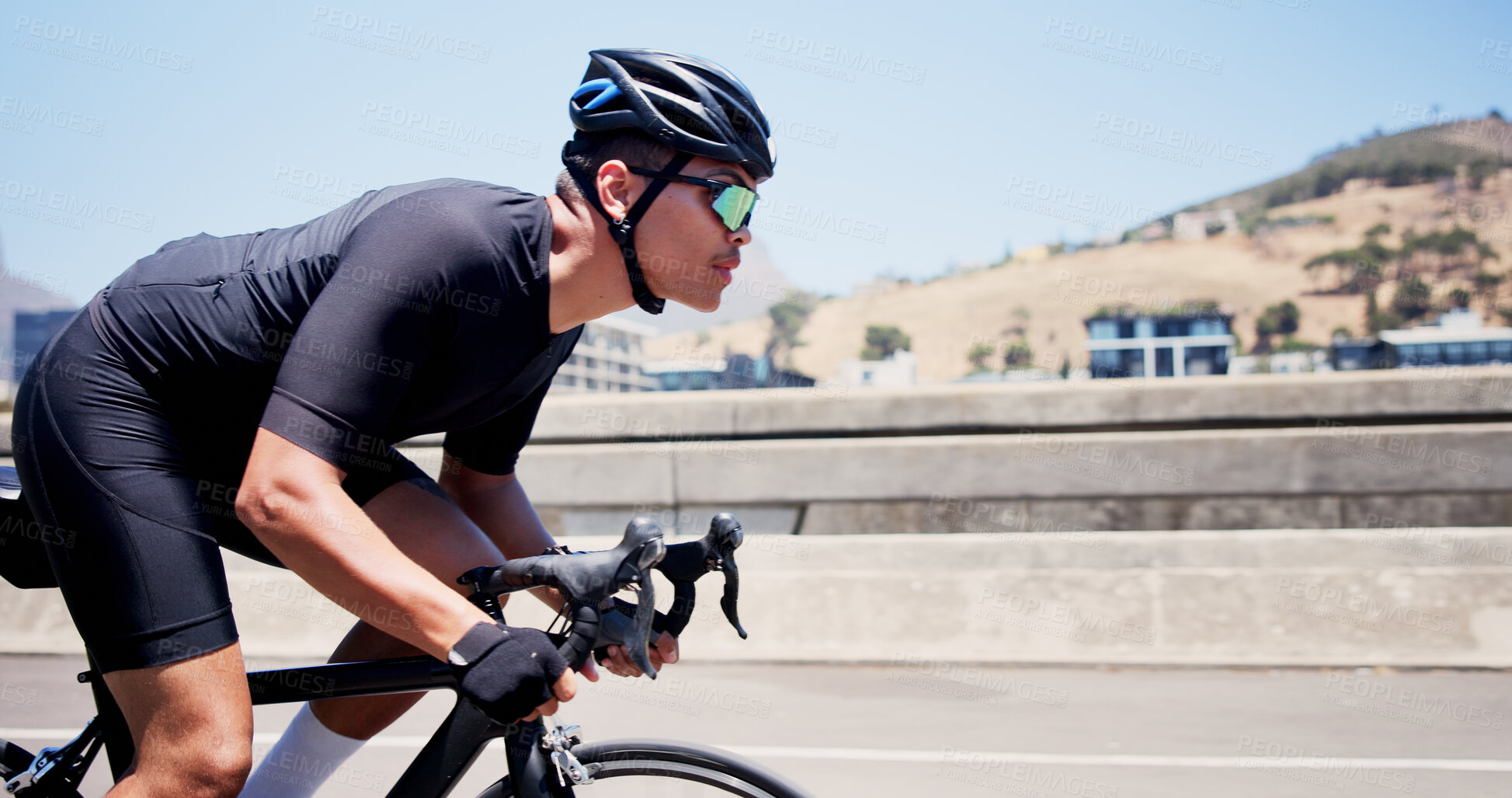 Buy stock photo Man, bicycle and exercise on bridge in city, speed and helmet for training with sunglasses in summer. Person, cyclist and profile on bike, cardio workout or challenge for fitness in urban town