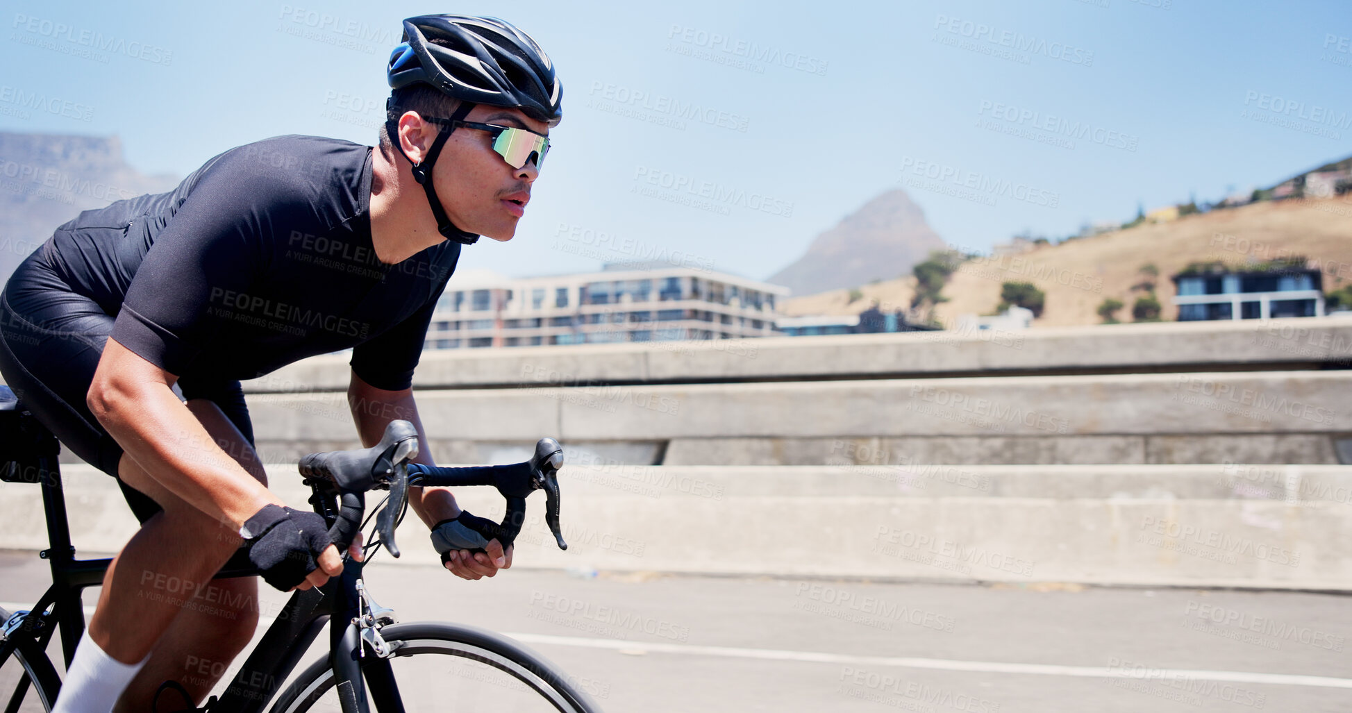 Buy stock photo Man, bicycle and fitness on bridge in city, speed and helmet for training, sky and sunglasses in summer. Person, cyclist and space on bike, exercise or workout for cardio challenge in urban town