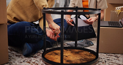 Buy stock photo Furniture, hands or couple in house with assemble, help or bonding in home setup. Teamwork, diy project or people in living room with building, installation together or support in interior decoration