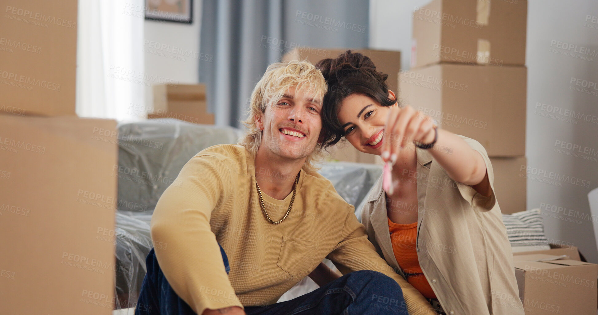 Buy stock photo Happy couple, portrait and boxes with keys in new home for property investment or mortgage together. Man, woman or homeowners with smile or purchase for moving in, renovation or relocation in house