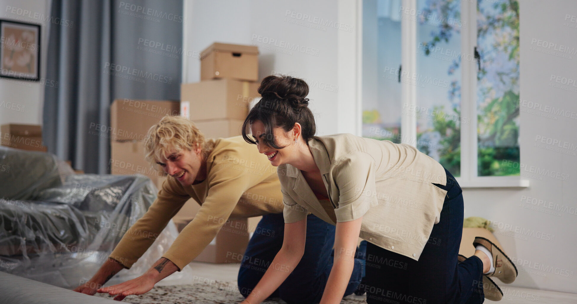 Buy stock photo Boxes, carpet and new home with couple on floor together for interior design of real estate. Love, moving day and rolling mat with happy people in living room of apartment for property investment