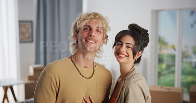 Buy stock photo Hug, moving day and portrait of couple in living room of new home for real estate investment. Boxes, happy and love with people embracing in apartment together for growth, mortgage or property