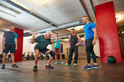 Buy stock photo Coach, old man and squat in gym with pipe for mobility exercise, physical activity or wellness. Personal trainer, senior person or pvc equipment with advice for workout, stability or fitness support.