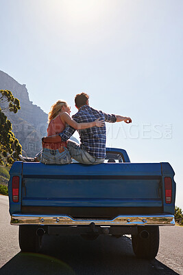 Buy stock photo Couple, travel and point in truck for vacation, adventure date and summer road trip together. Tourism, love and man with woman, bonding and sightseeing in vehicle for holiday, journey and transport