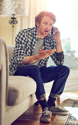 Buy stock photo Phone call, stress and talking with man on sofa in home for fraud dispute, negotiation and spam crisis. Communication, frustrated and scam mistake with person in living room of apartment for angry