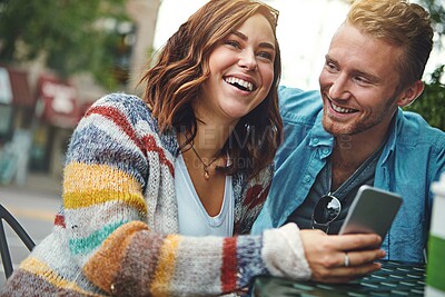 Buy stock photo Phone, outdoor and people at coffee shop on date with laughing for social media, networking or texting. Happy, technology and man with woman on cellphone for chatting on mobile app together at cafe.