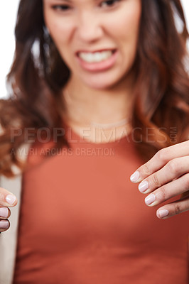 Buy stock photo Disgust, hands and woman with holding, grimace facial expression and dislike for unknown object. Upset, cringe reaction and person with negative emotion for product placement, uncomfortable and gross