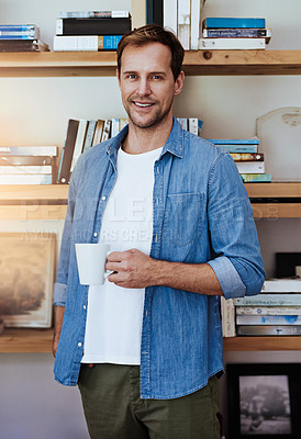Buy stock photo Portrait, happy and man with coffee, home and author with self published books on shelf or creative. Confident, writer and person with caffeine on break, relax and smile for indie career development