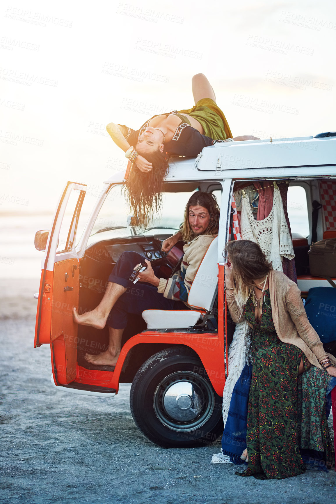 Buy stock photo Beach, friends and bonding with guitar, van and group on summer vacation, travel and relax in nature. Outdoor, travelers and people with music instrument on holiday, break and road trip with vehicle