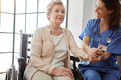 Buy stock photo Holding hands, nurse and senior woman in wheelchair for checkup with support, empathy or service. Compassion, medical help and healthcare worker with elderly patient with disability for consultation.