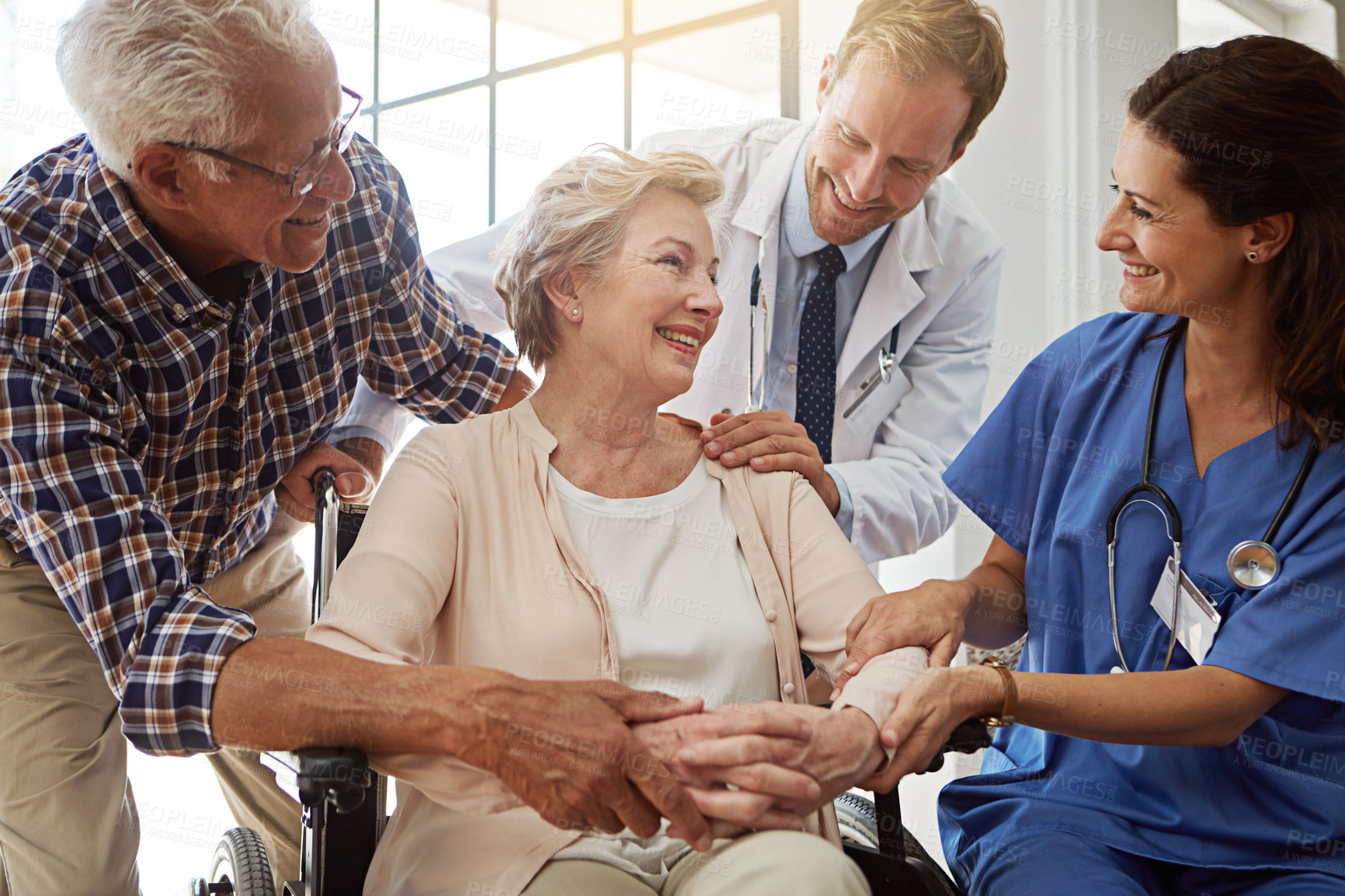 Buy stock photo Doctor, nurse and senior woman in wheelchair at nursing clinic for healthcare discussion. Couple, checkup and elderly female patient with disability with medical employees in retirement facility.
