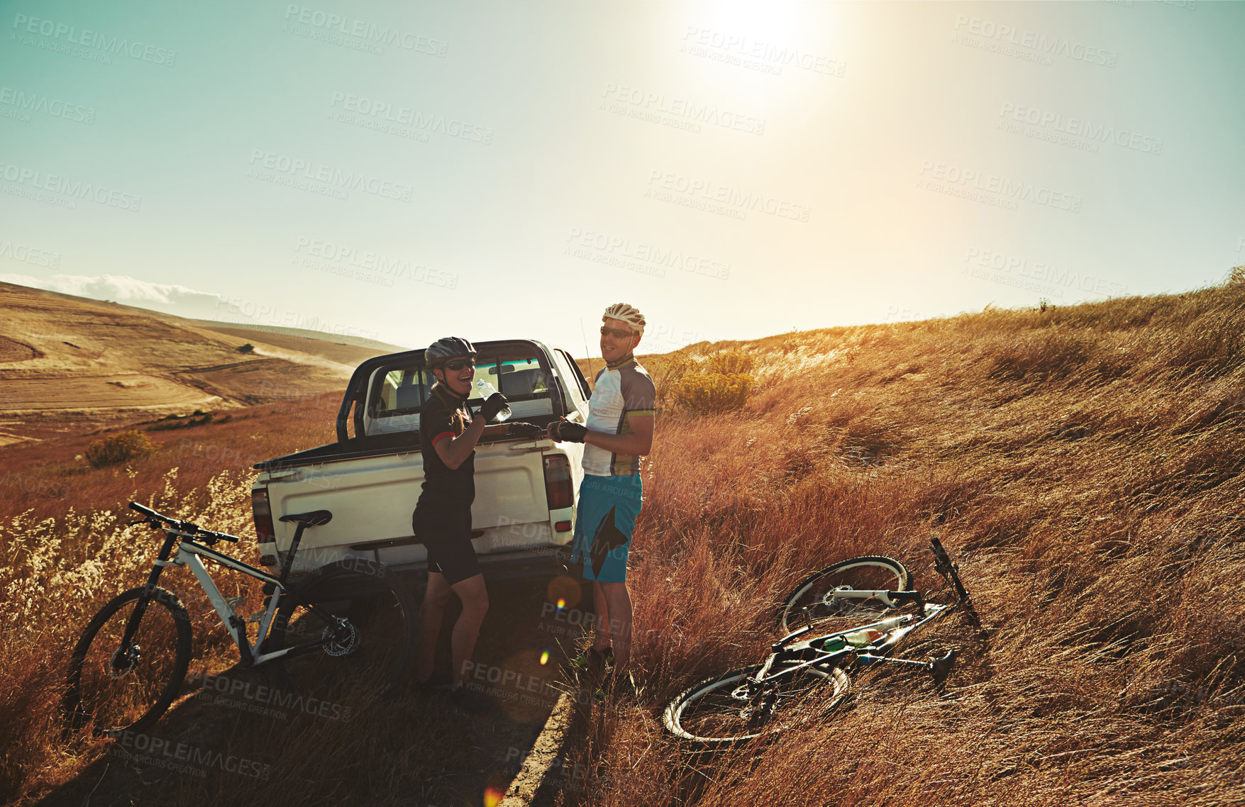 Buy stock photo Cycling, countryside and men with bicycle by car for fitness, exercise and training in nature. Sports, sunrise and people with bikes in truck for adventure, travel and active hobby on outdoor trail