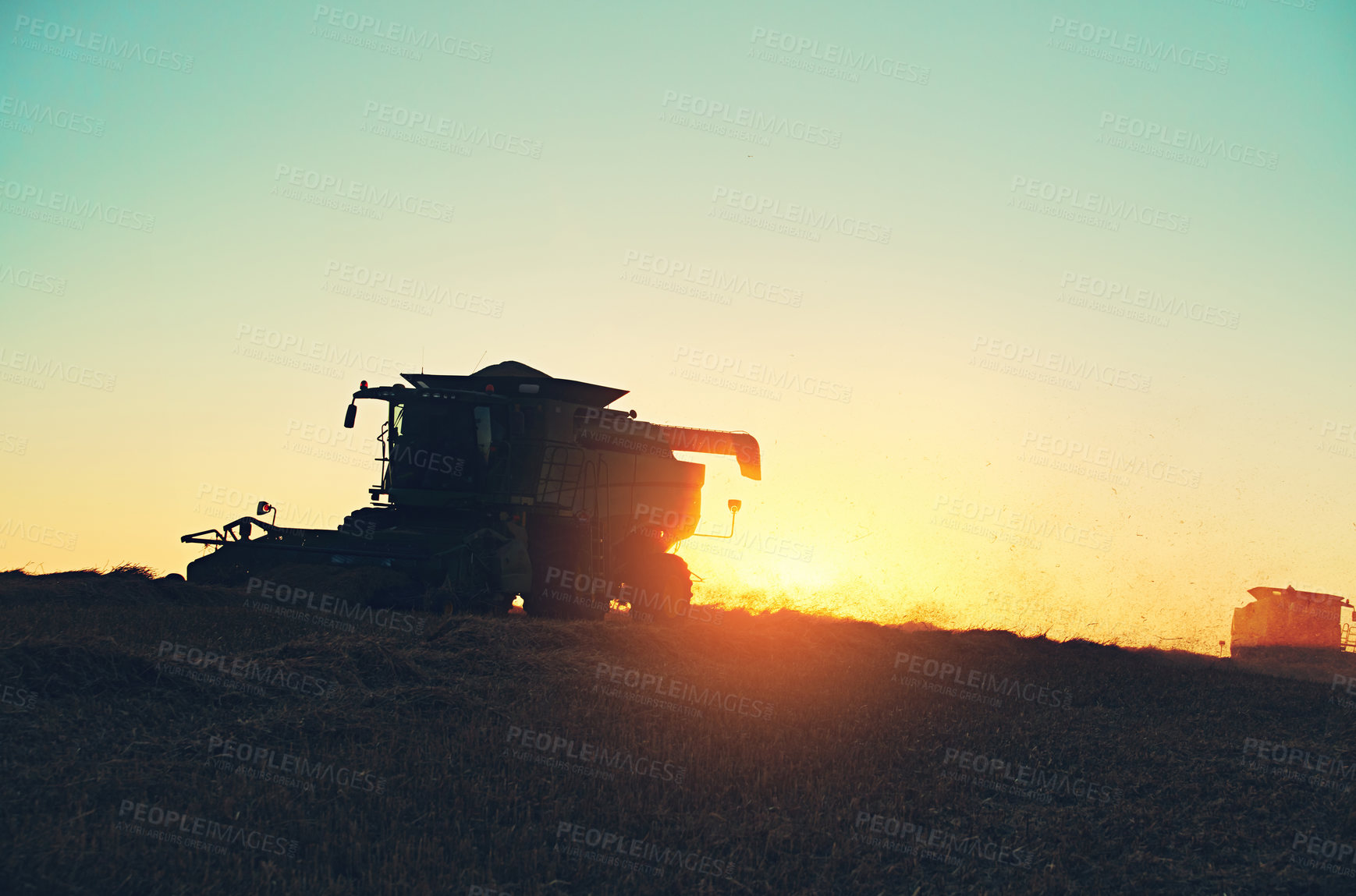 Buy stock photo Nature, sunset and combine harvester of field for environment, countryside and flare on horizon. Outdoor machine, morning and landscape of rural farm with agriculture, ecosystem and agribusiness