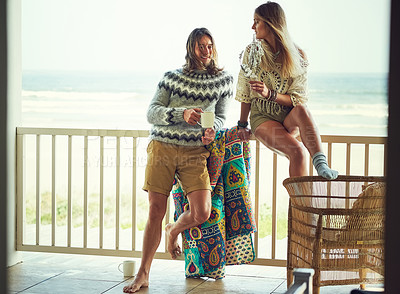Buy stock photo Couple, relax and man with coffee, balcony or romance with flowers on break, comfortable and bonding. Happy, people and woman with floral gift, morning and beverage on weekend, relationship and home