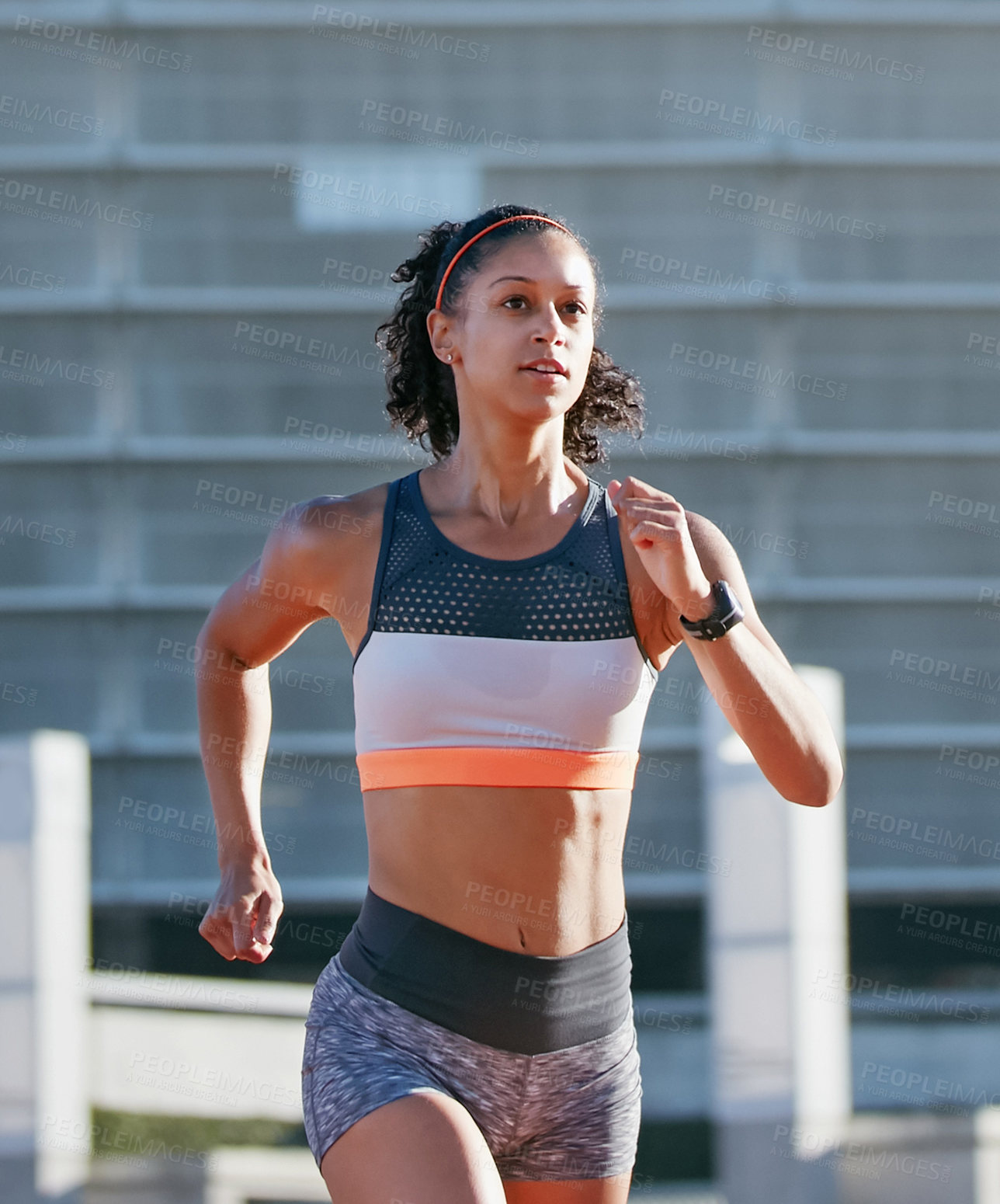 Buy stock photo Runner, training and woman in city, sport and exercise routine for health goals, serious and active. Outdoor, athlete and African person on weekend, cardio and wellness with workout for fitness