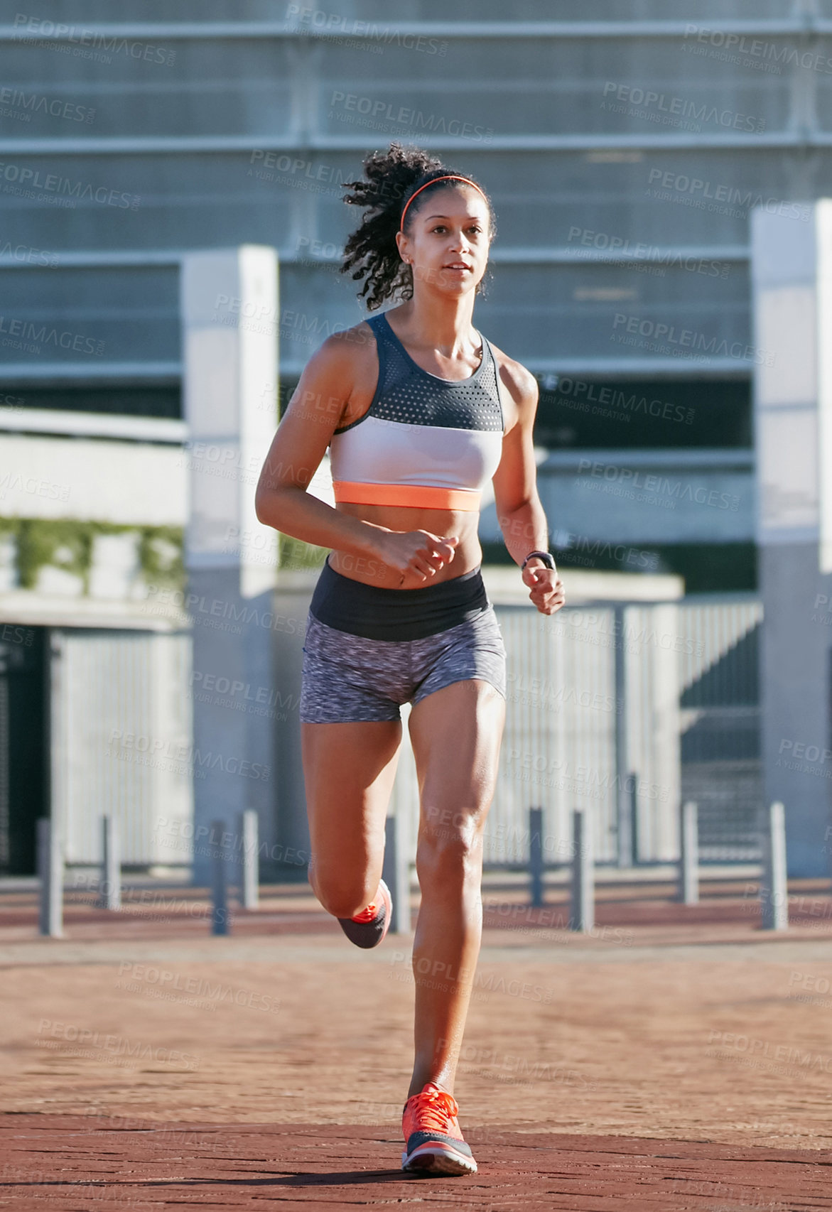 Buy stock photo Running, athlete and woman in city, sport and workout routine for health goals, training and active. Serious, runner and African person on weekend, cardio and wellness with exercise for fitness