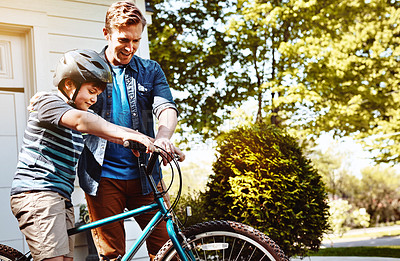 Buy stock photo Dad, boy and bike for teaching in street with smile, talk and explain for balance, safety or bonding. Happy people, father and child on bicycle, learning or support for motivation in neighborhood