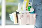 Home, cleaning and chemical products in a bucket for home care work and spring clean routine. Macro of cleaner with detergent spray, bottles and tools to scrub the interior of household.