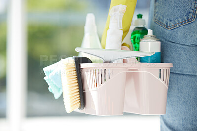 Buy stock photo Home, cleaning and chemical products in a bucket for home care work and spring clean routine. Macro of cleaner with detergent spray, bottles and tools to scrub the interior of household.