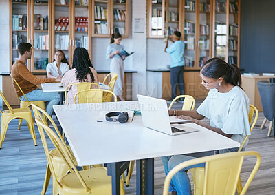 Buy stock photo Studying, library and student in university writing ideas in notebook, planning research strategy on laptop for course work. Community, education and knowledge with college people learning and books