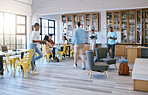 Creative campus, library and students studying, research or working in community workspace with morning sunshine lens flare. Group of people with books, reading and information search in college life