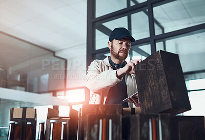 Buy stock photo Courier, tablet and packaging in warehouse with check for beer, stock and inventory for Oktoberfest in Munich. Man, storage and boxes for delivery with alcohol, touchscreen and app for supply chain