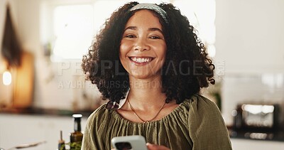 Buy stock photo Woman, portrait and mobile in kitchen for social media, text message and research recipe ideas. Girl, smartphone and happy in home for connectivity, communication and smile for weekend planning