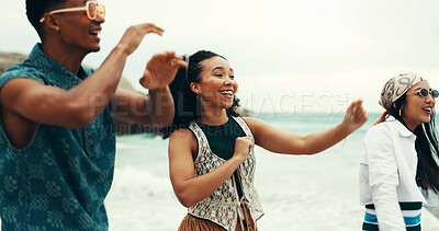 Buy stock photo Happy, people and dancing on beach outdoor with energy, movement and vacation reunion for rave festival. Group, friends and rhythm at island party, summer freedom and bonding together of travel trip 