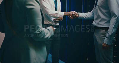 Buy stock photo Agreement, handshake and welcome with people in server room for network administration deal. Cybersecurity, meeting and thank you with team shaking hands in data center for tech support collaboration