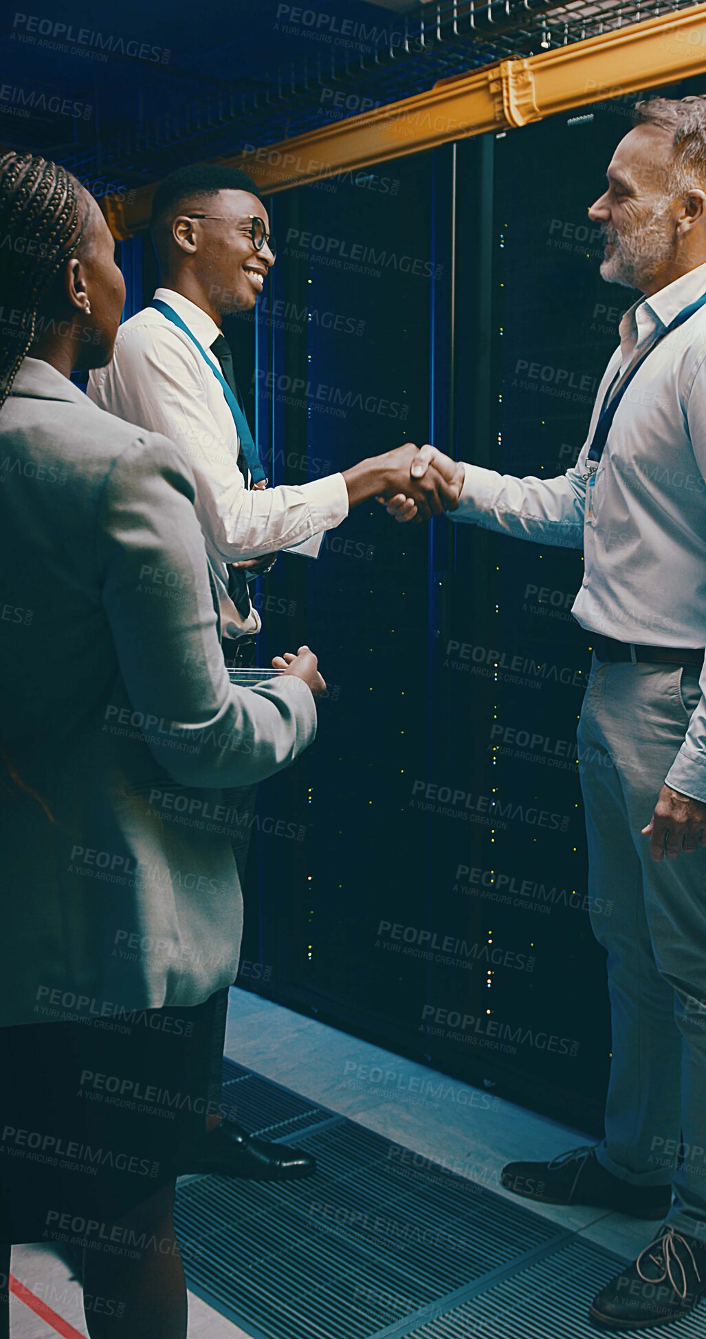Buy stock photo Handshake, cybersecurity and team with people in server room for database, software engineer or partnership. Technician, collaboration and cloud computing with employees shaking hands for it contract