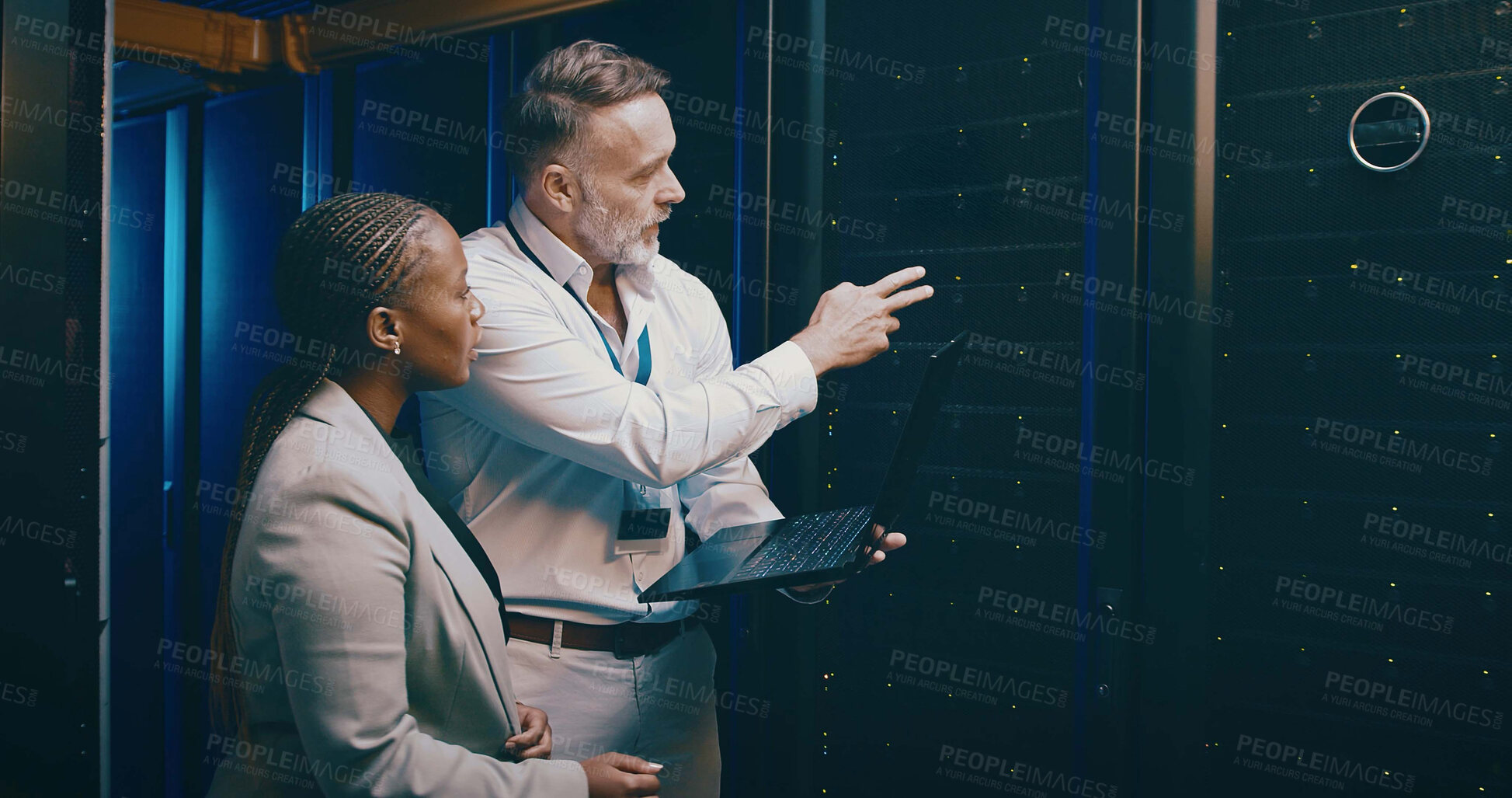 Buy stock photo Laptop, team or people in datacenter for planning, backup or IT training with intern. Collaboration, tech or engineer in server room for maintenance, cloud computing or help manager with data storage