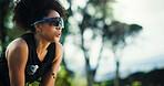 Breathing, nature and woman on break with running, workout or training for marathon outdoor. Tired, fitness and female athlete with cardio exercise in forest for race practice with rest in woods.