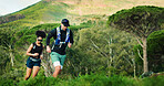 Fitness, hiking and running with couple in forest together for challenge, performance or training. Exercise, space and workout with hiker people outdoor in nature for development, hobby or journey