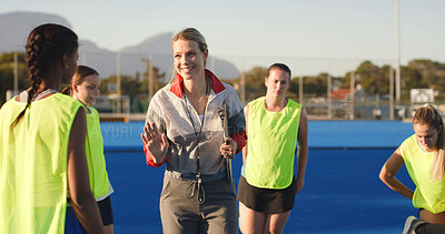 Buy stock photo Field hockey, talking and coach with women outdoor for training, practice and match strategy. Sports hobby, fitness and people on turf with exercise for playing game, competition and tournament