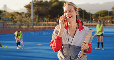 Buy stock photo Coach, hockey and happy woman with phone call for match organization, conversation and event info. Planning, mobile or sport trainer with clipboard on turf, game arrangement and local league opponent