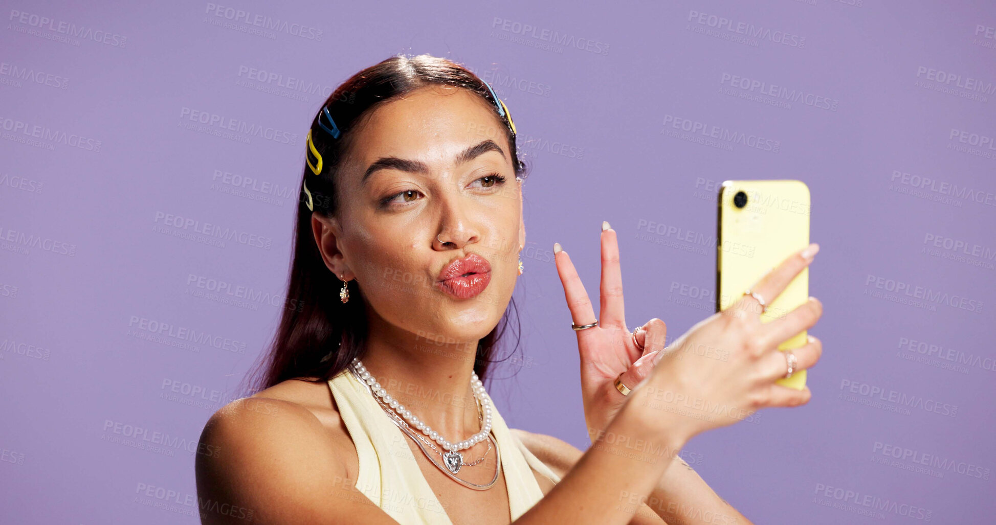 Buy stock photo Beauty, peace sign and selfie with influencer woman in studio for product review on social media. App, haircare and pout of gen z content creator isolated on purple background for post or update