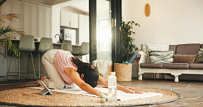 Buy stock photo Woman, stretching and yoga with tablet at house for fitness, online class and balance with core strength. Female person, childs pose and tutorial video for flexibility, inner peace and zen wellness