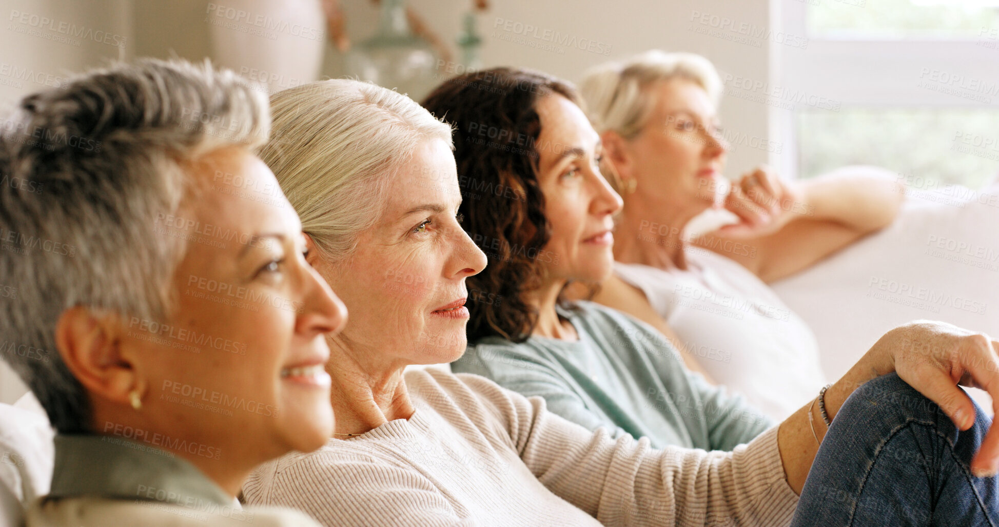 Buy stock photo Mature women, watching tv and smile on sofa for movie choice, show or series in home. People, group or friends with video, film or bonding for living room entertainment or reunion together in house