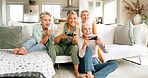 Senior, happy women or playing with video games on sofa for friendly competition or match in home. Elderly, female people or group of gamers with smile for console entertainment on couch in house